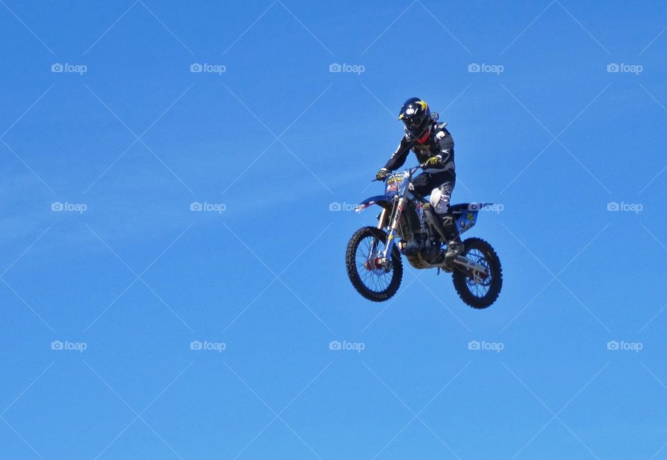 Motorcycle Jump. Jumping A Motorcycle High Into The Air
