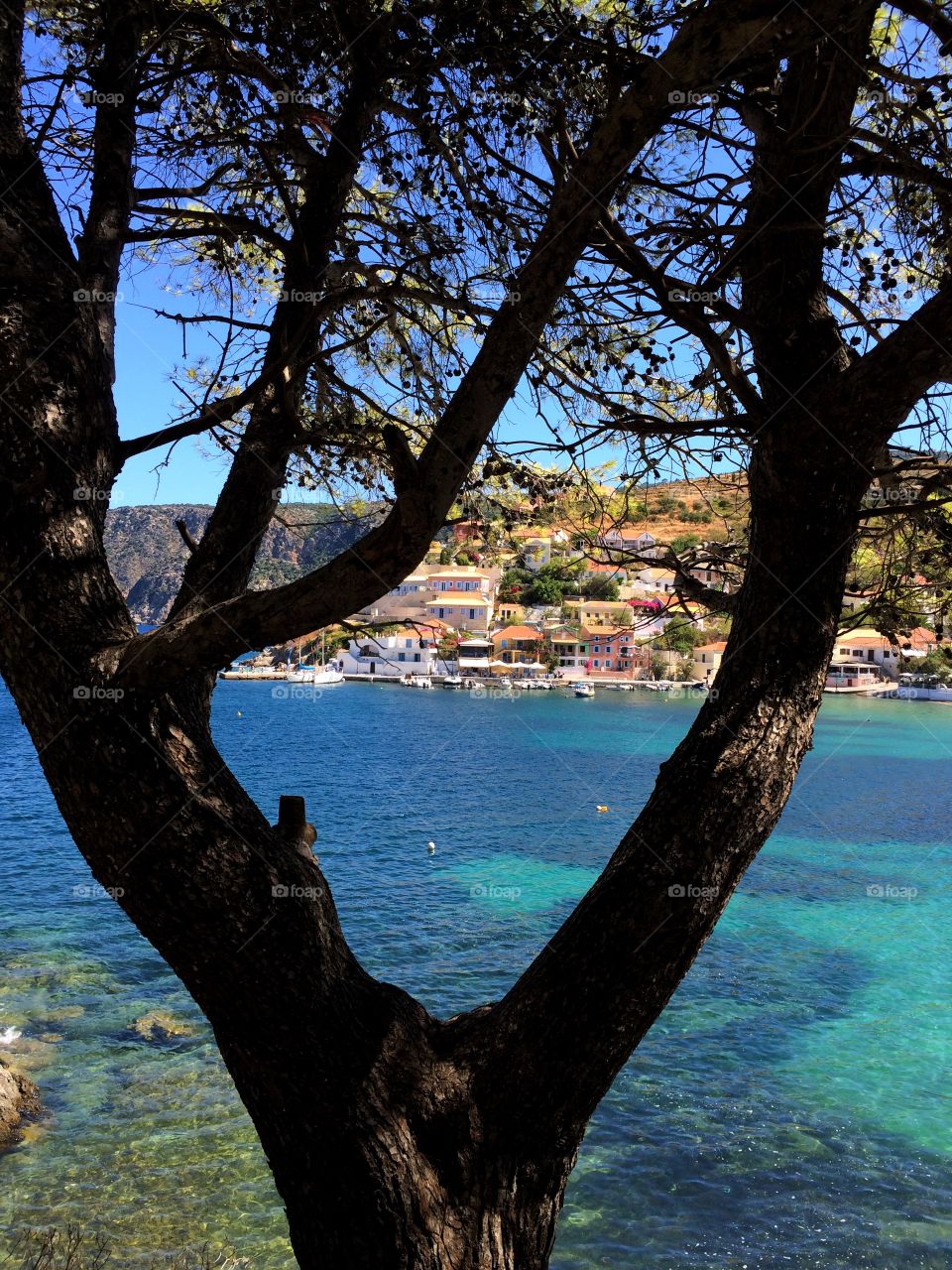 Peephole. Taking a walk up to the castle in Assos, Kefalonia