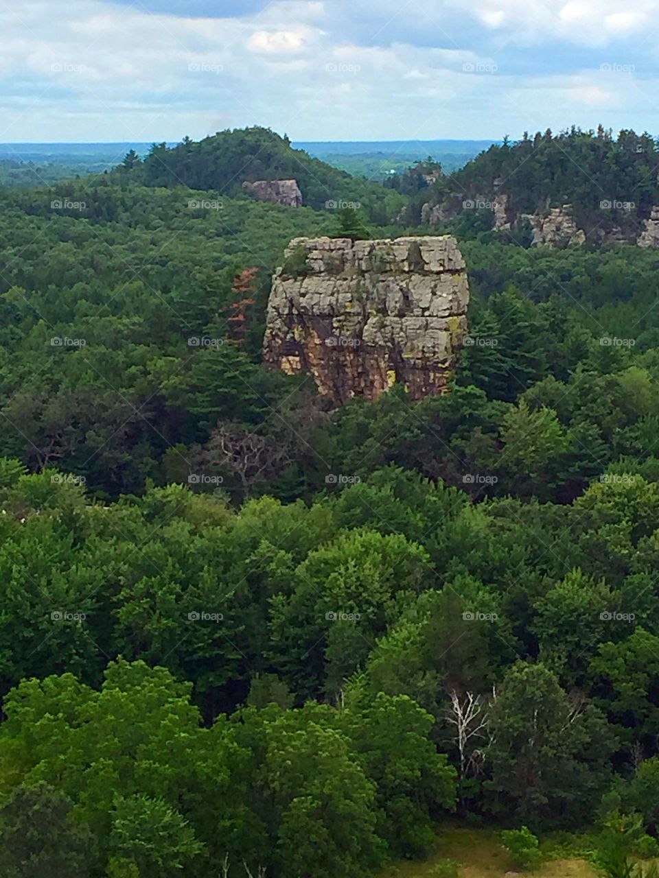 Small Bluff from Afar. A small bluff taken from the top of Mill Bluff at Mill Bluff State Park in Camp Douglas, Wisconsin.