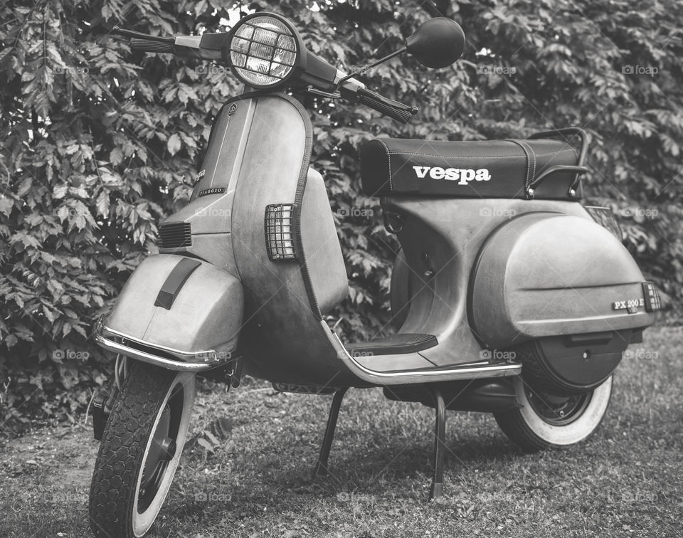 Palic, Serbia. April 26, 2018: Vintage classic Vespa motorcycle photographed in a park