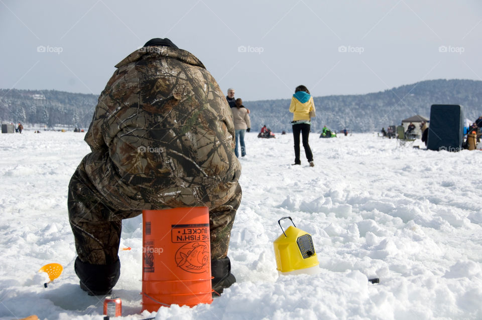 Ice fishing at the fishing derby on Lake Winnepesaukee