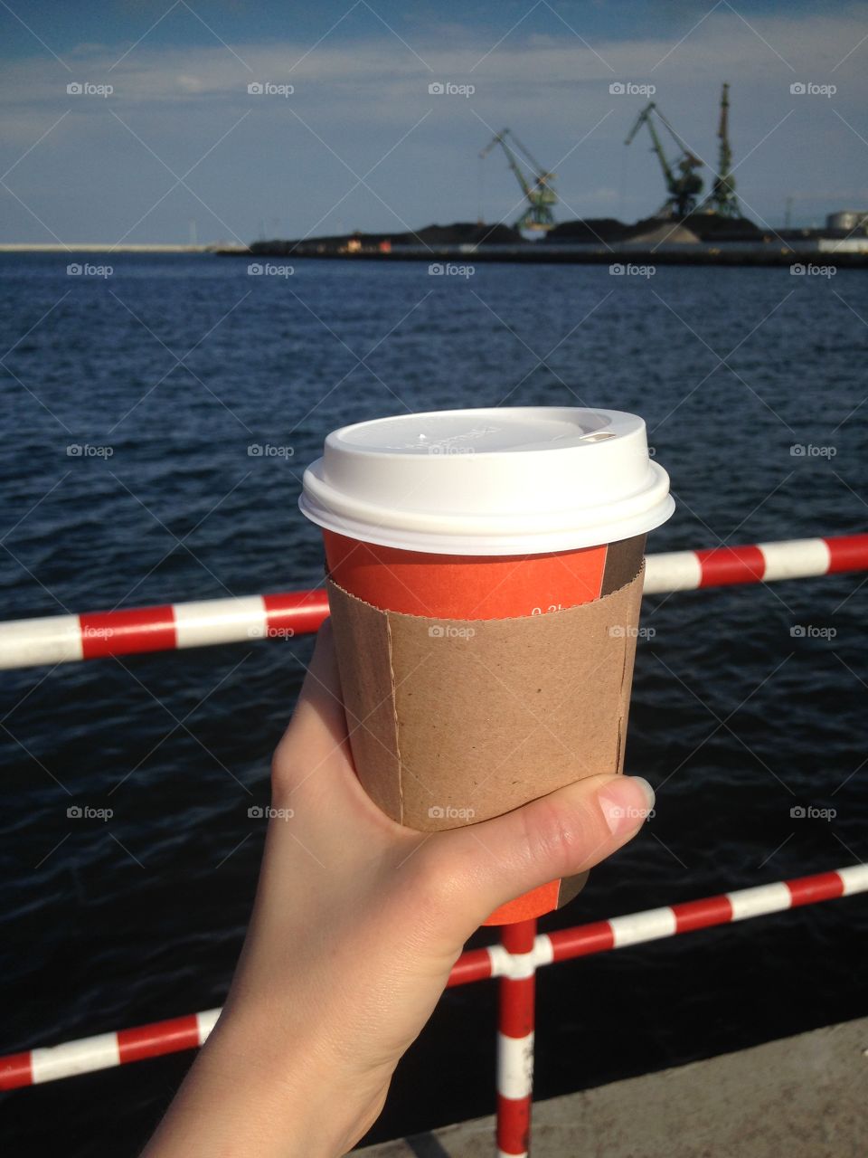 Drinking coffee at the seaside 