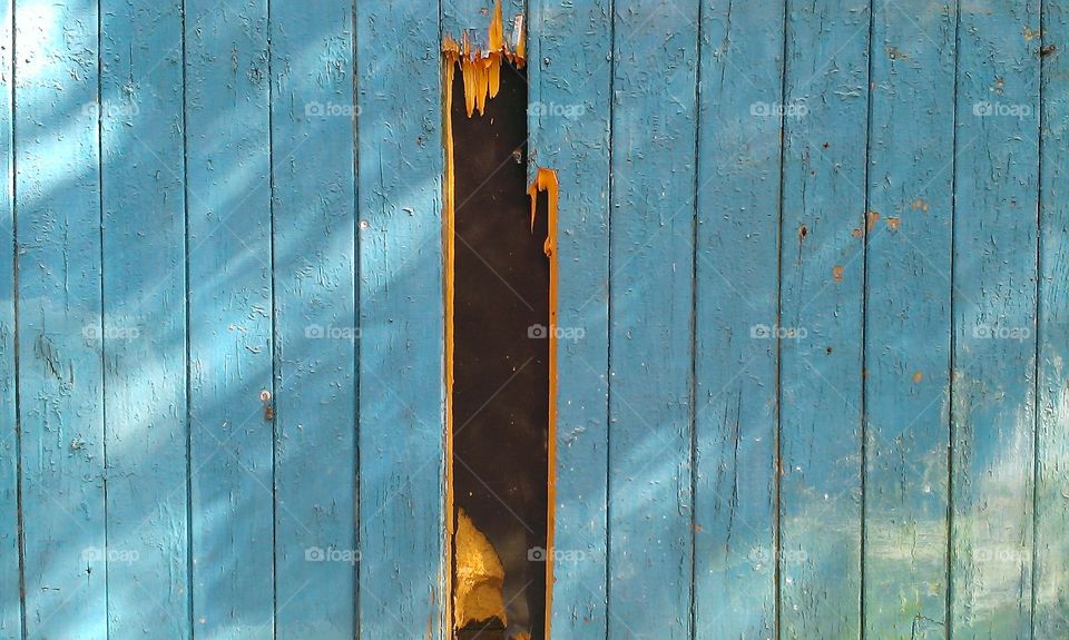 blue facade of a wooden house