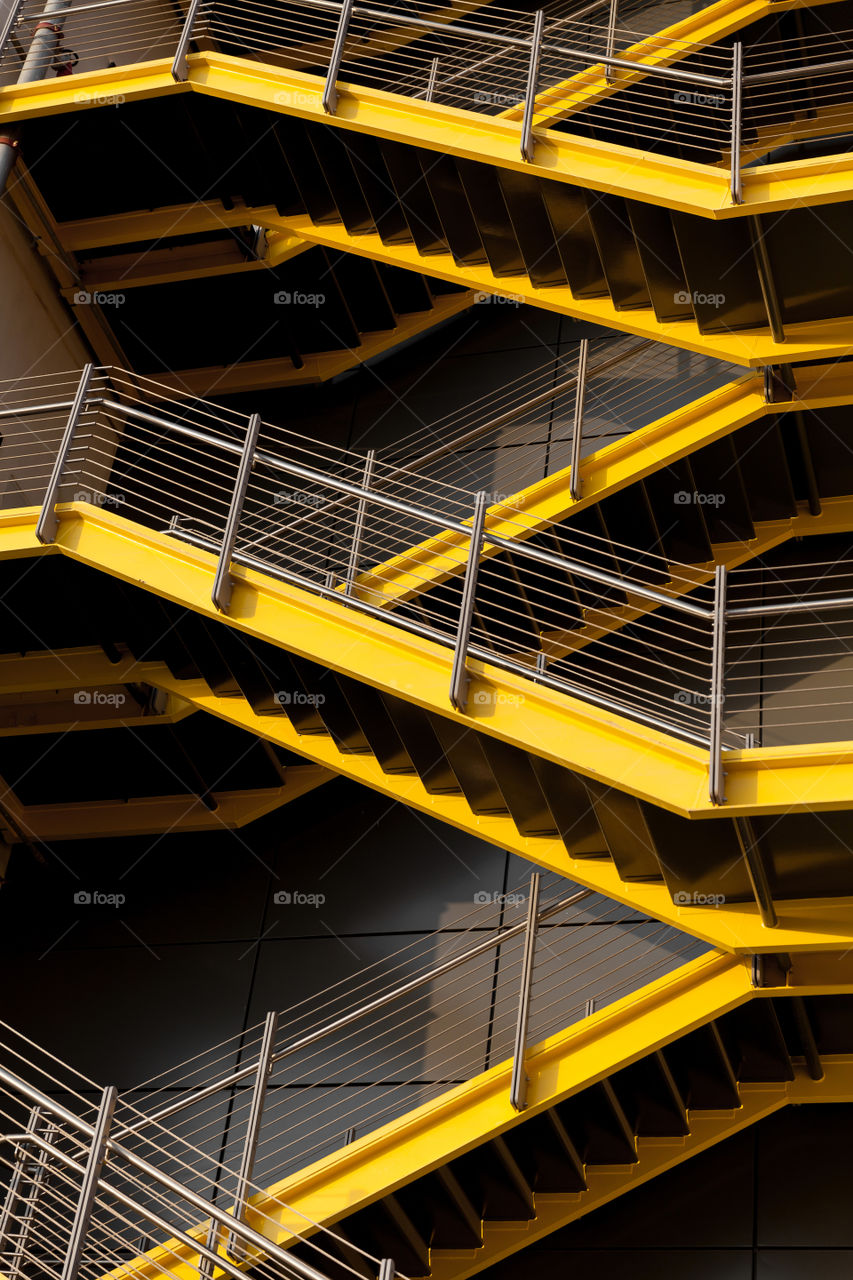 Modern staircase colored in yellow