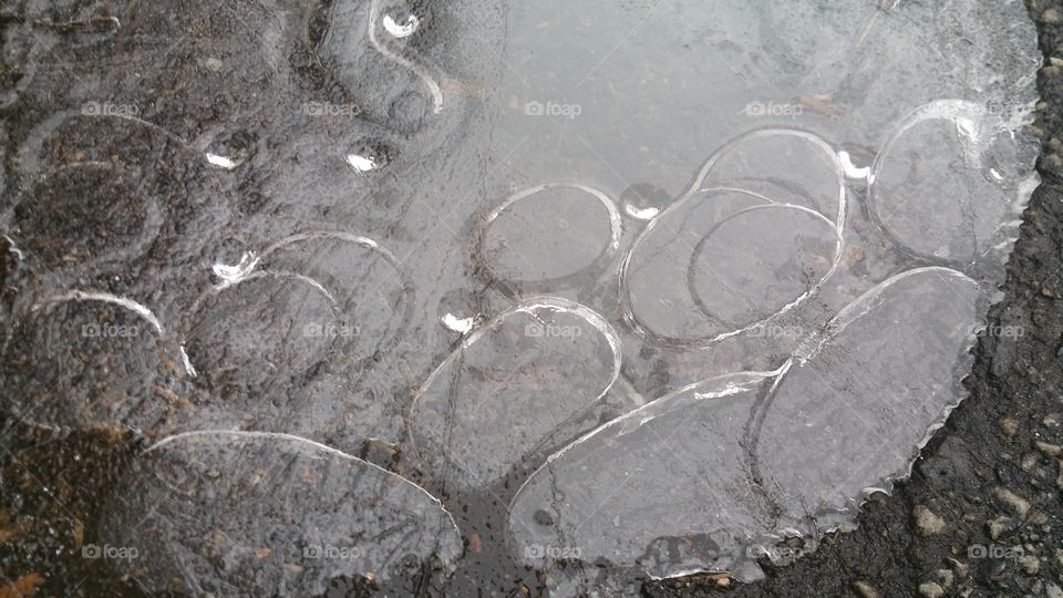 Ice bubbles on pavement