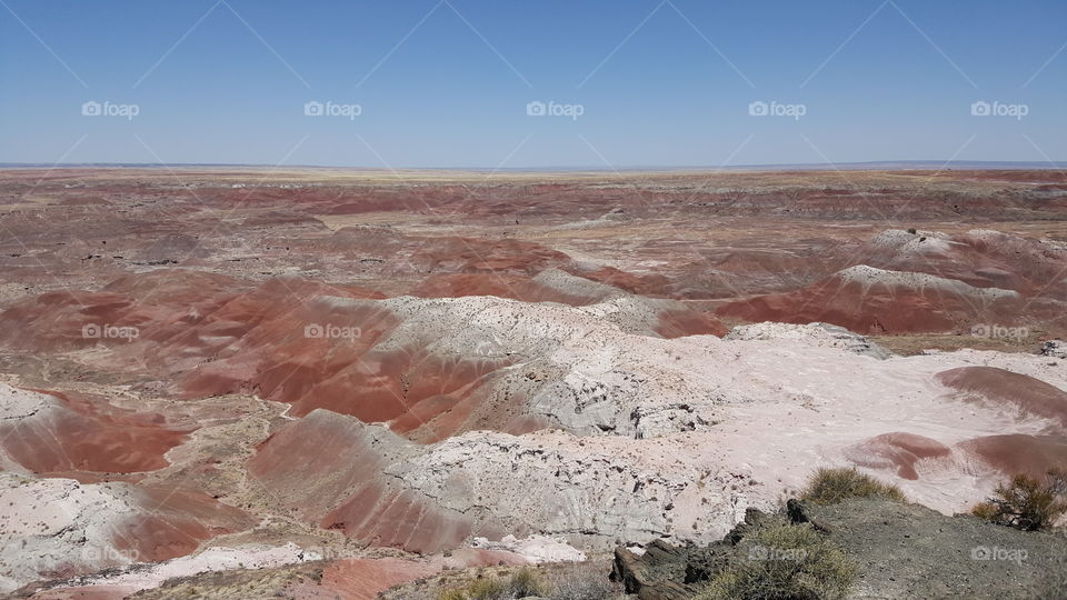 View of the Painted Desert from the rim of a quiet hilltop. Petrified Forest, Holbrook Arizona