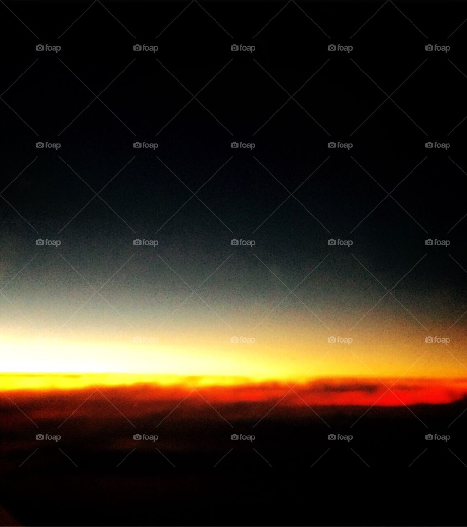 A vista de um amanhecer vista do alto do avião. Faz tempo, mas isso é atemporal...