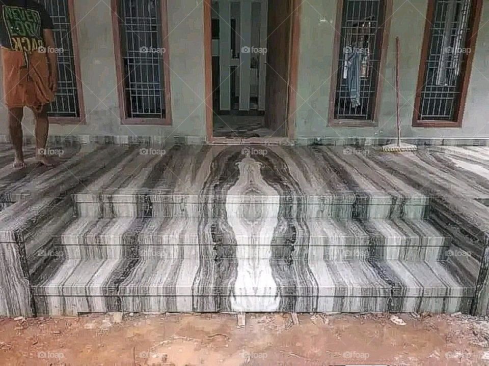 Marble stone installed in the stairs of the house.