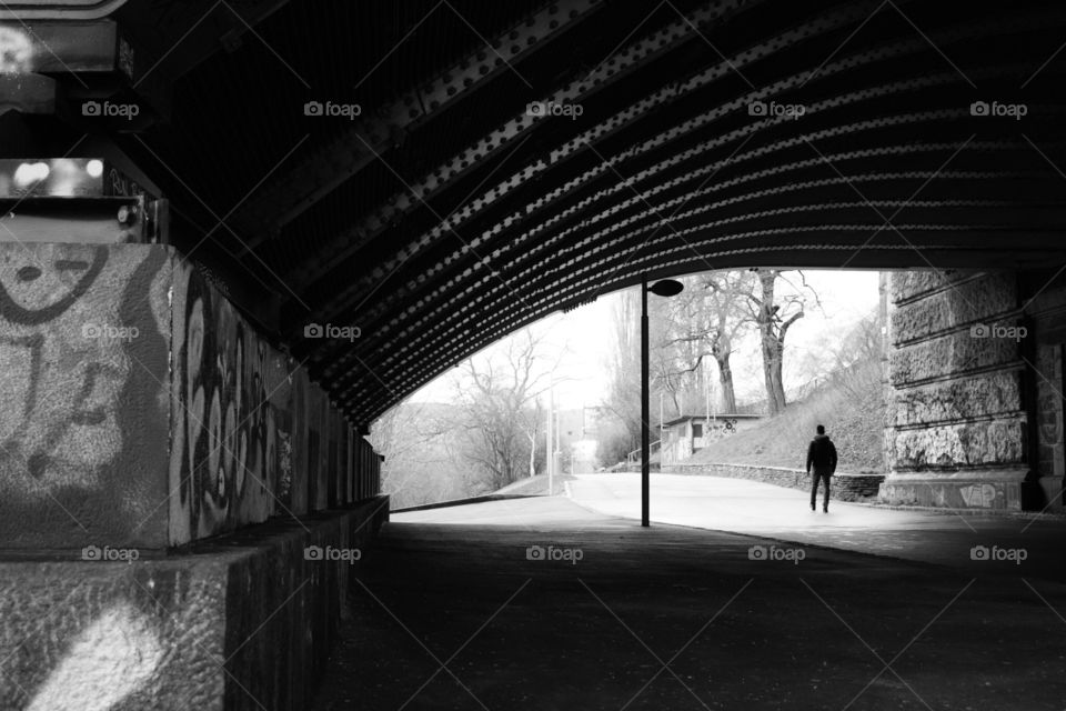 Walking under the bridge