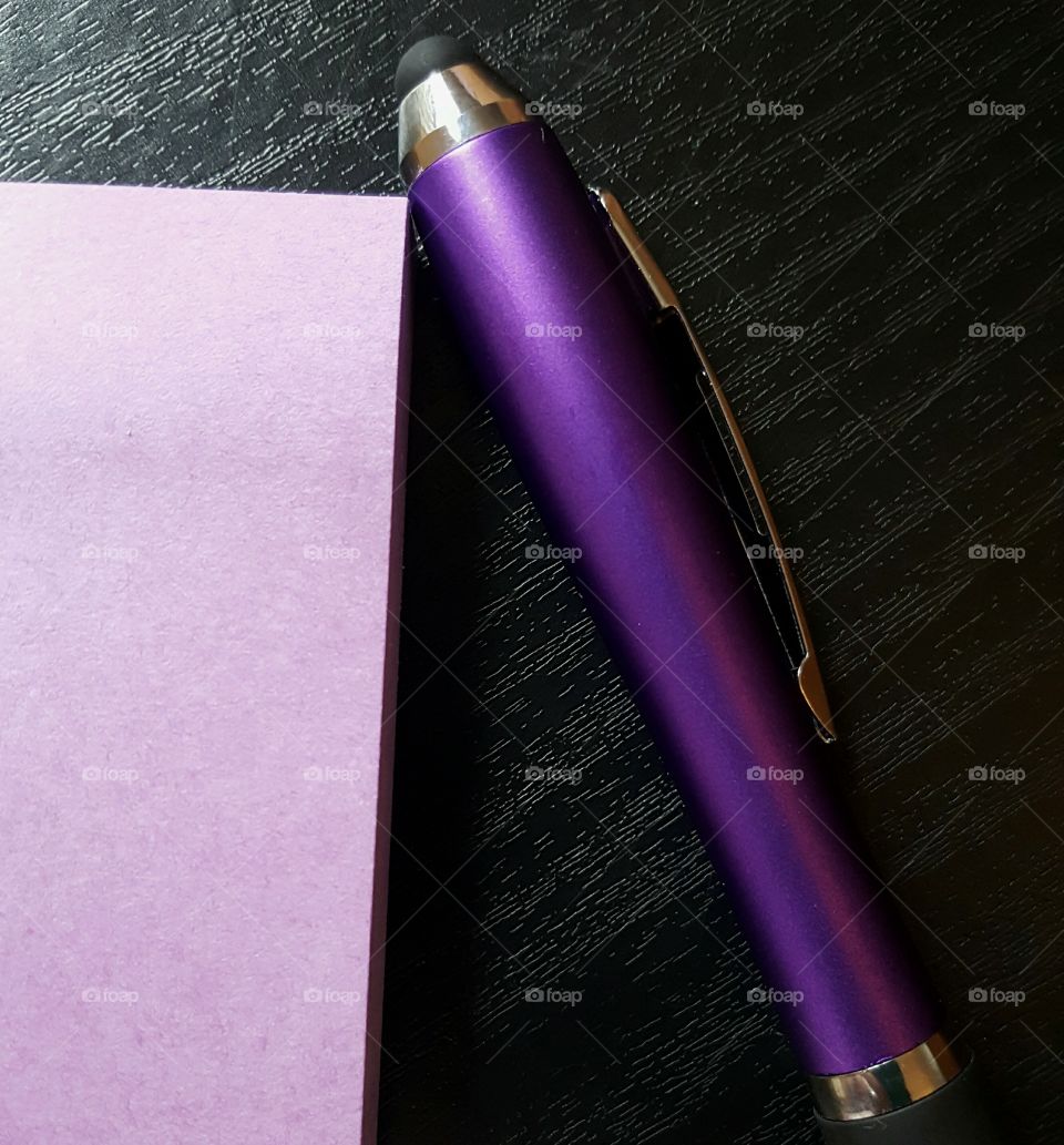 Purple paper and pen