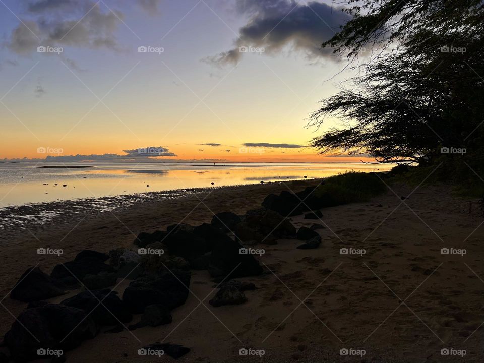 Beautiful sunset at Kuliouou Beach Park in Hawaii Kai