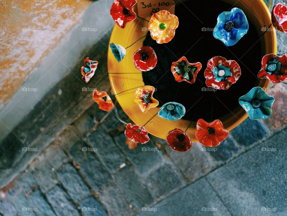  Ceramic flowers in a pot on the street 