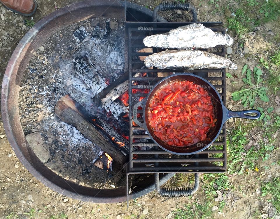Shakshuka being made over the fire