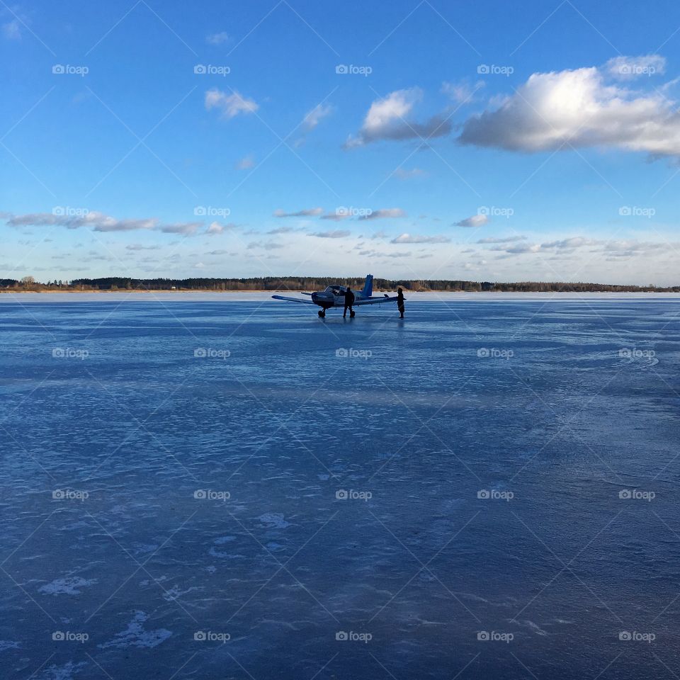 Plane landed on the frozen lake