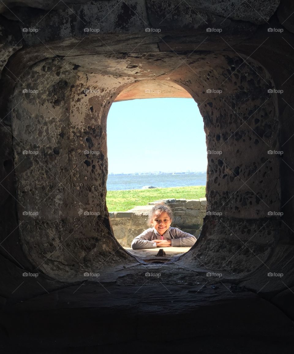 Girl in a Stone Window