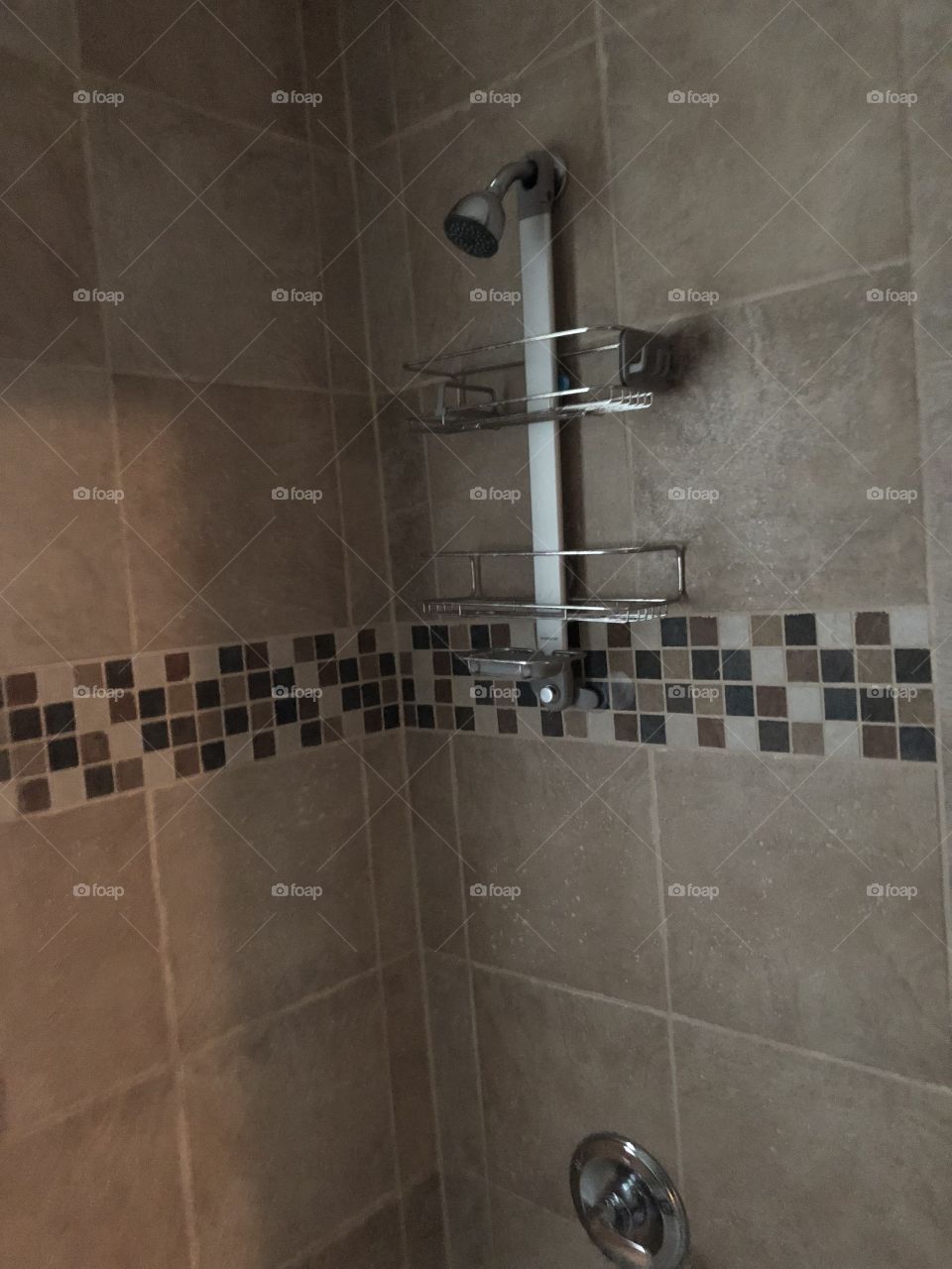 Beautiful shower, tiled and clean. 