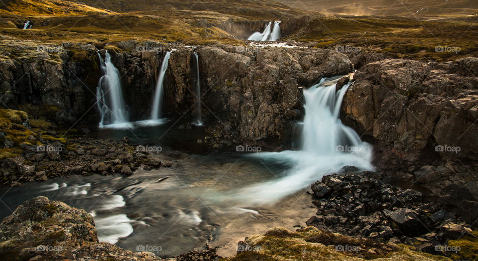 Multiple waterfalls at sunset in Iceland 