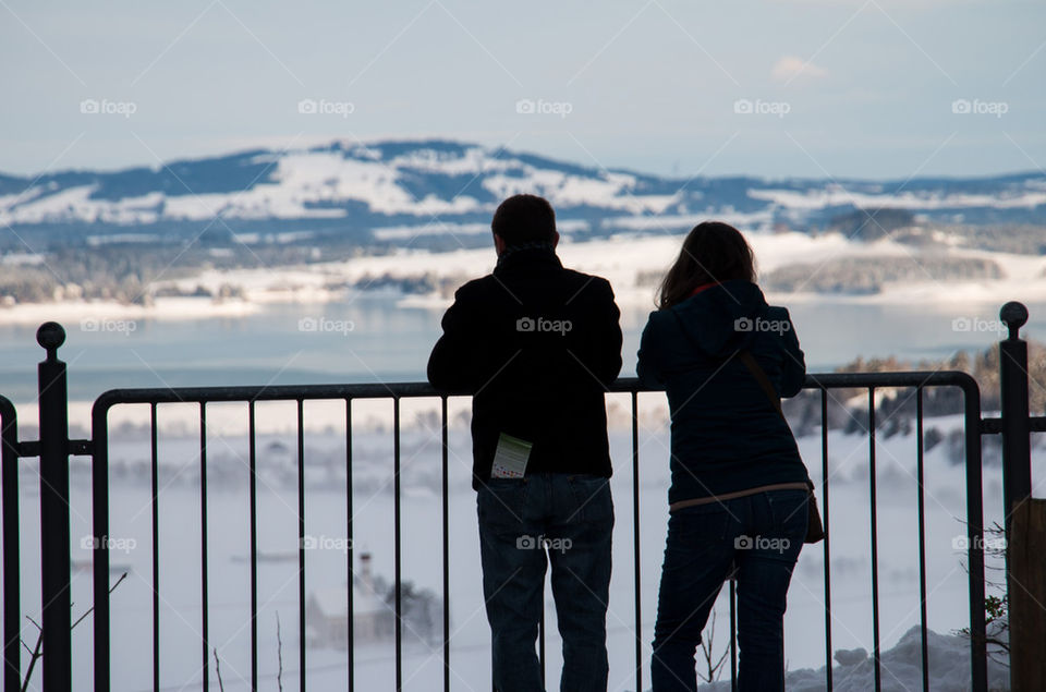 Couple enjoying the snowy view