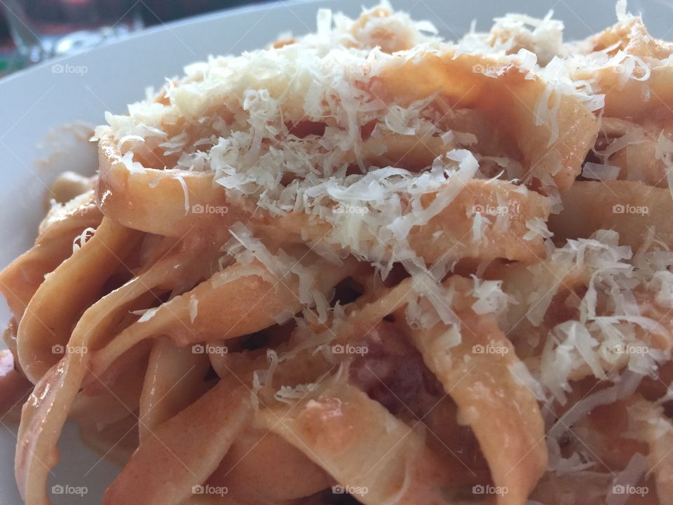 Fresh pasta with tomato and cream sauce