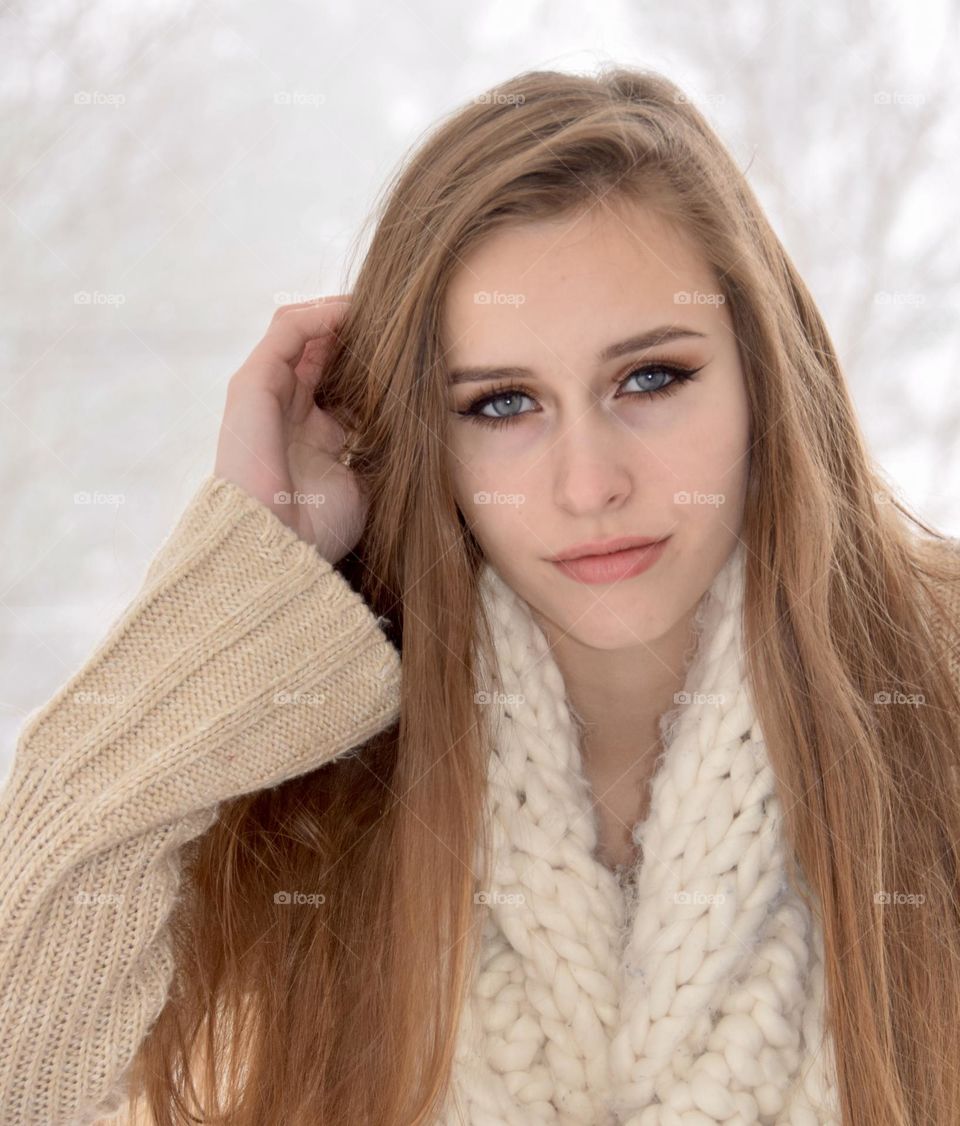 Natural beauty, young women, with beautiful complexion, long hair, serious expression, outdoors, winter time