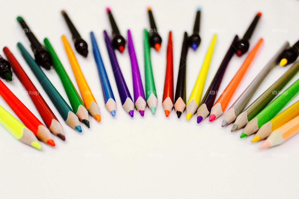 colored pens in a row