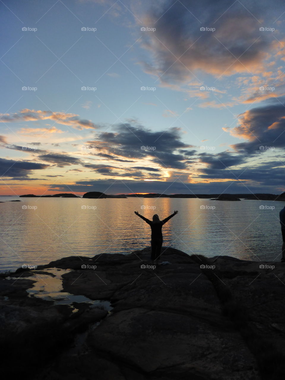 A human enjoying the sunset