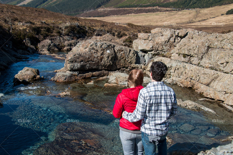 Rear view of a couple at beach