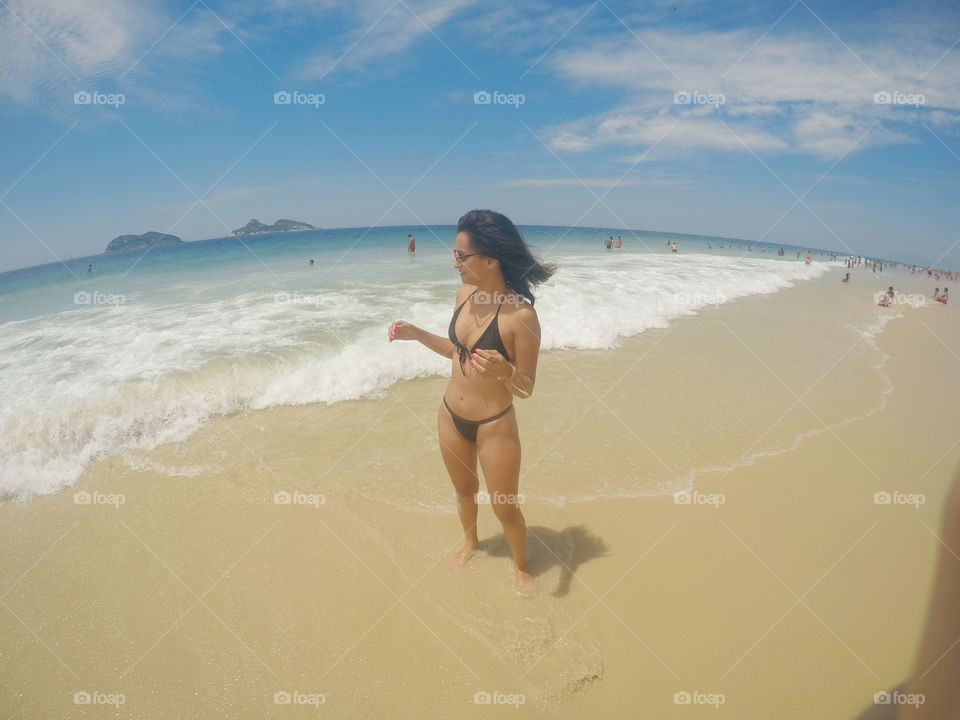 Woman in swimsuit at beach