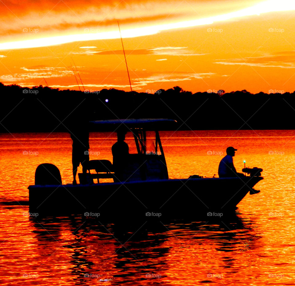 Amazing Silhouettes! Like the meeting of two worlds - the known and the unknown. The sun is like a great big romantic, inspirational fire in the sky. Brilliant streaks of yellow, orange, gold, blue, pink and red overcome the blue and purple of the sky. The sky resembled a prism; all the colors blended perfectly together. It's as if the colors and intensity of the light is just right! My work is done for today. I'm not sure what tomorrow will bring, but I'll be prepared for it!