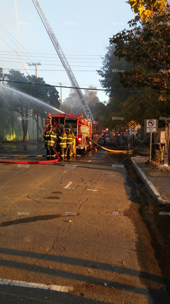 local heroes. fighting a building fire in downtown Sacramento