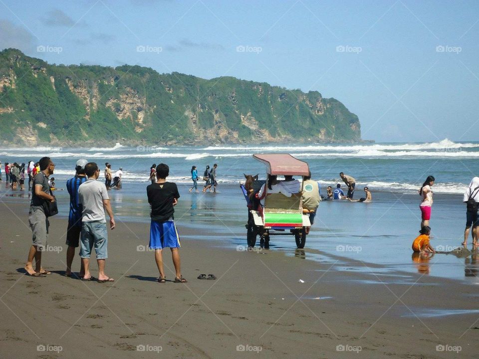 parangtritis beach. a day at the beach parangtritis ,, very beautiful with waves that seru.di jogja_indonesia