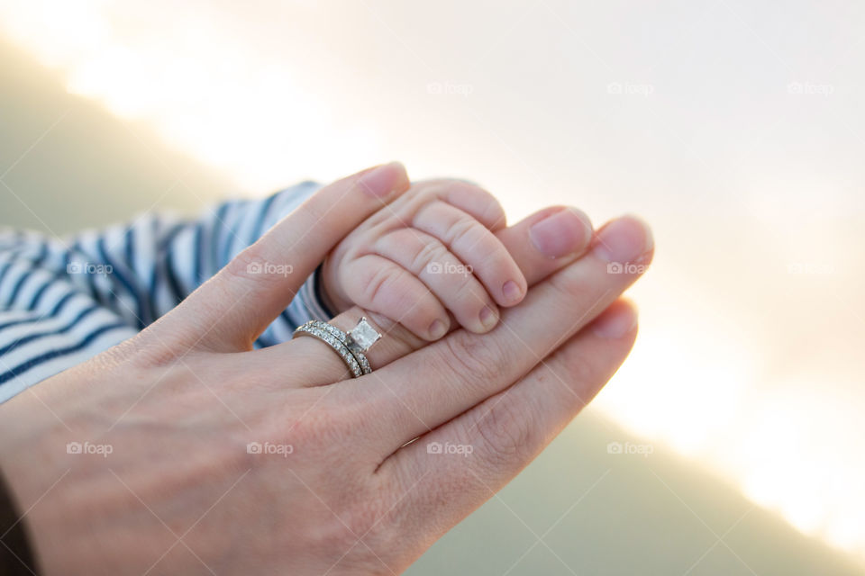 Mother and son hands 