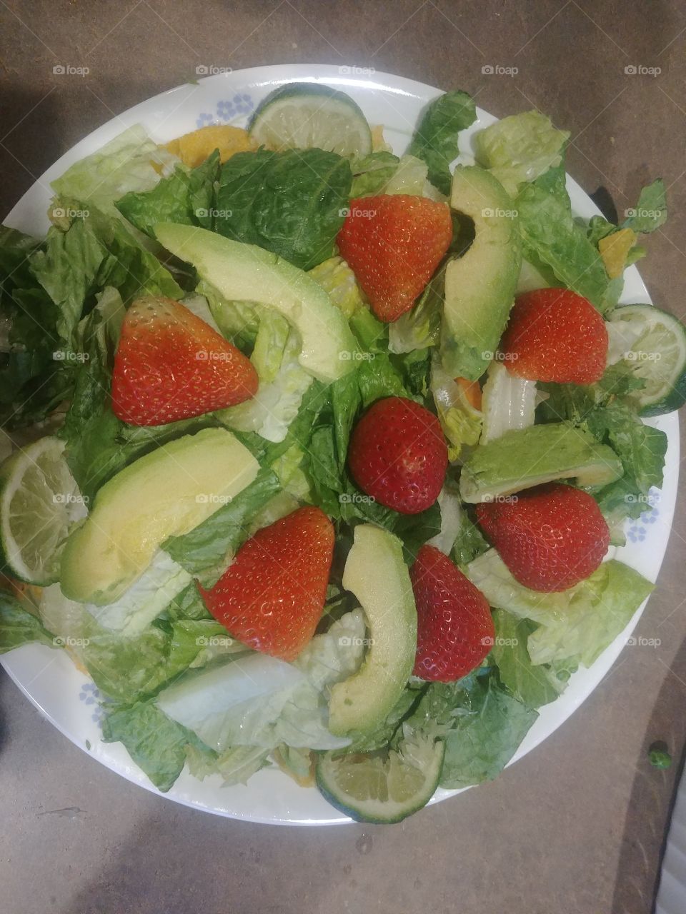 Level five is complete, salad greens, avacados, strawberries