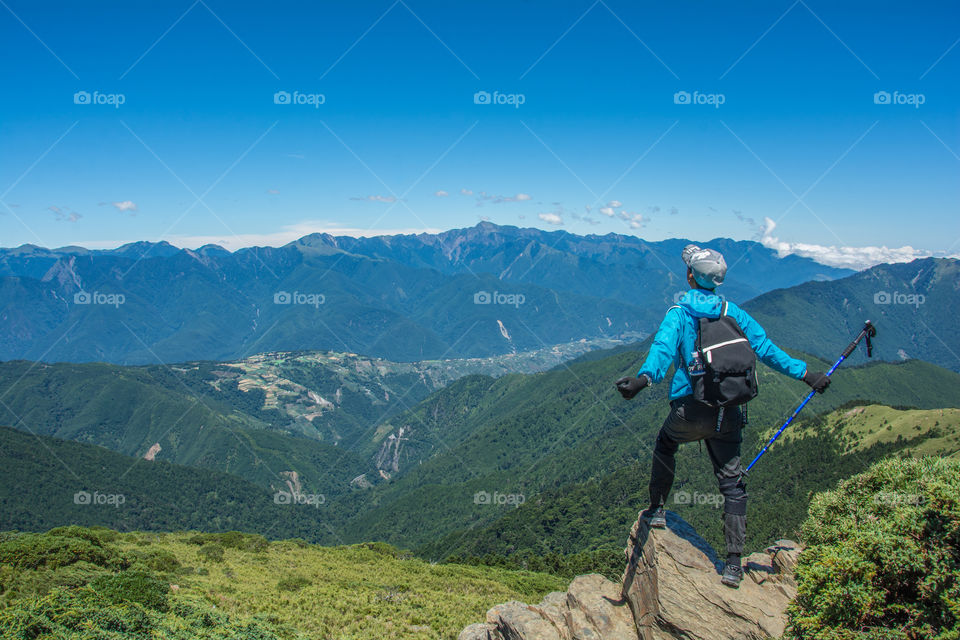 Mountain landscapes and mountain climber