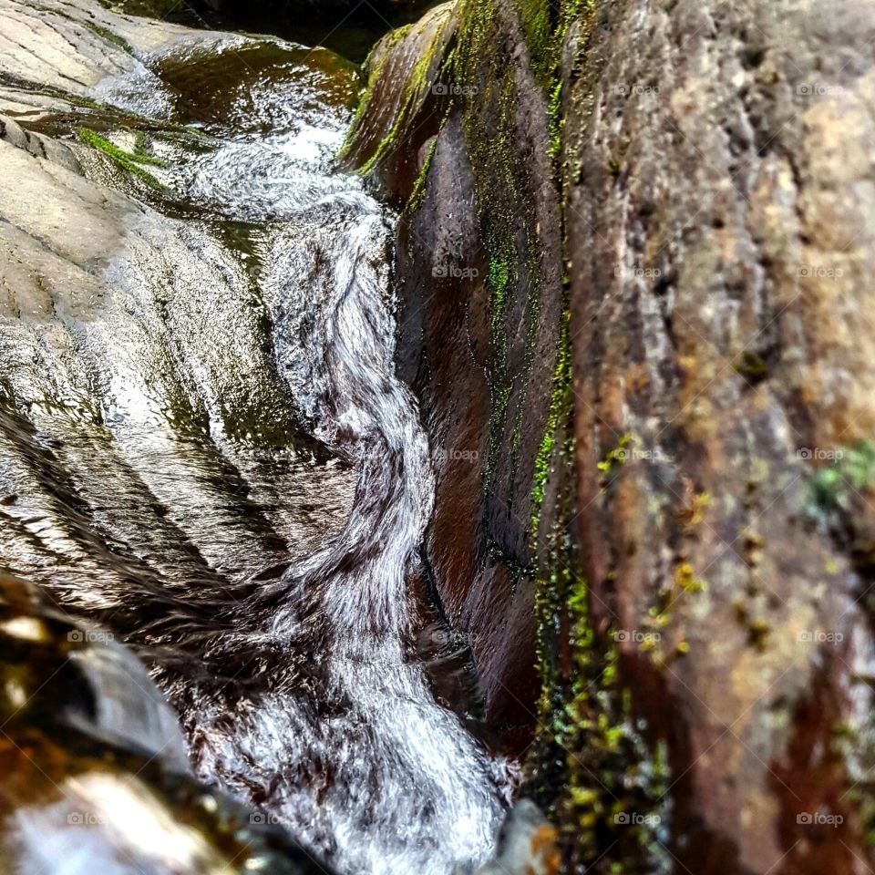 top of a waterfall. hiking at Rickett's Glenn
l