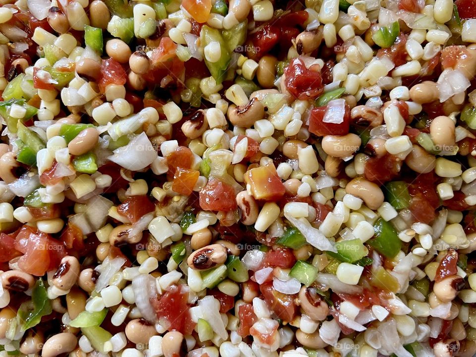 Vegetarian dip known in US as Texas Caviar. A mix of onion, bell pepper, shoe peg corn, diced tomatoes and black eyed peas, great served with chips!