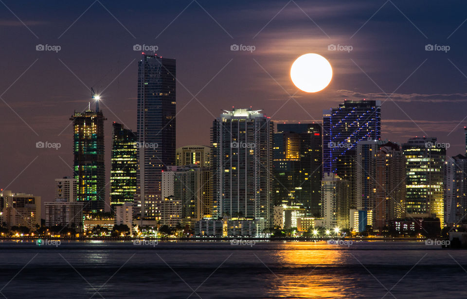 Miami skyline and full moon