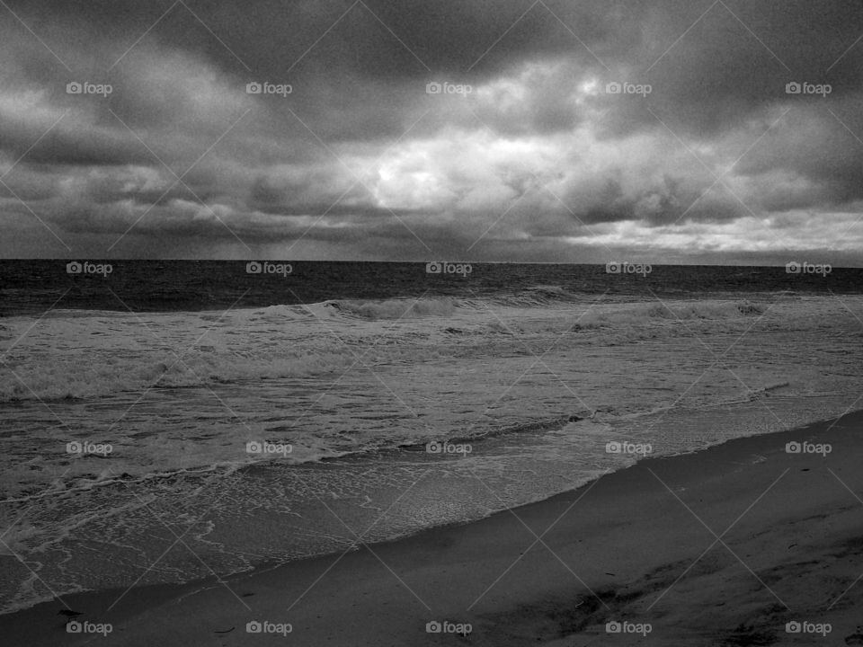 Storm clouds over beach