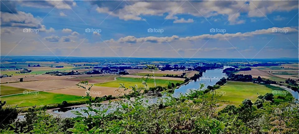 A panoramic overview of a Bavarian landscape photographed in the summertime of the year 2022 on a bright sunshiny day. Hypnotic Productions