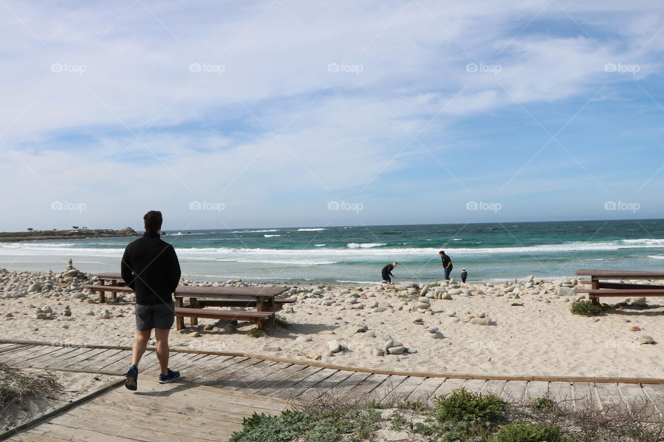 Sandy beach , people snd blue ocean -beautiful scenery that stays in mind forever 