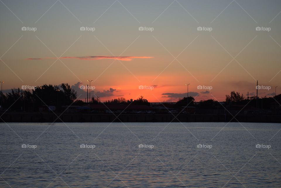 The Beautiful Sunset Sky Over The Lake