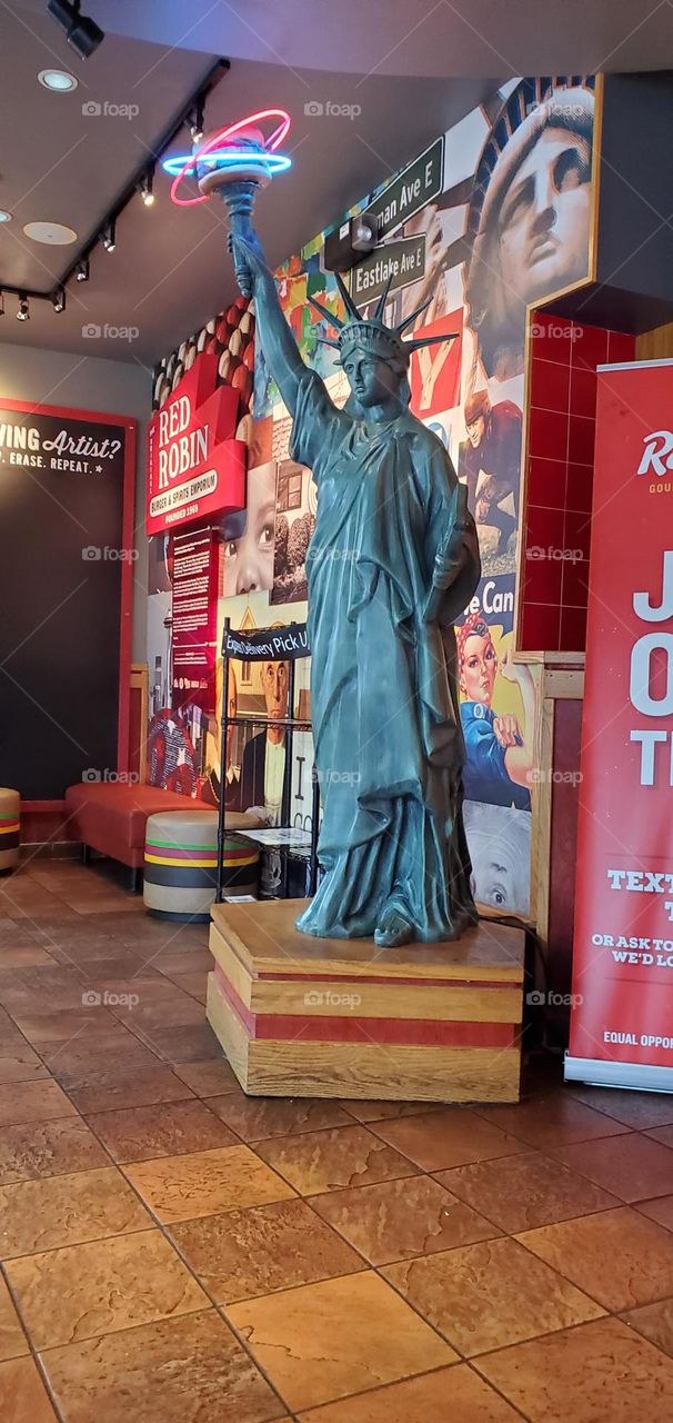 Miss Liberty a replica in a restaurant as a reminder of freedom & independence