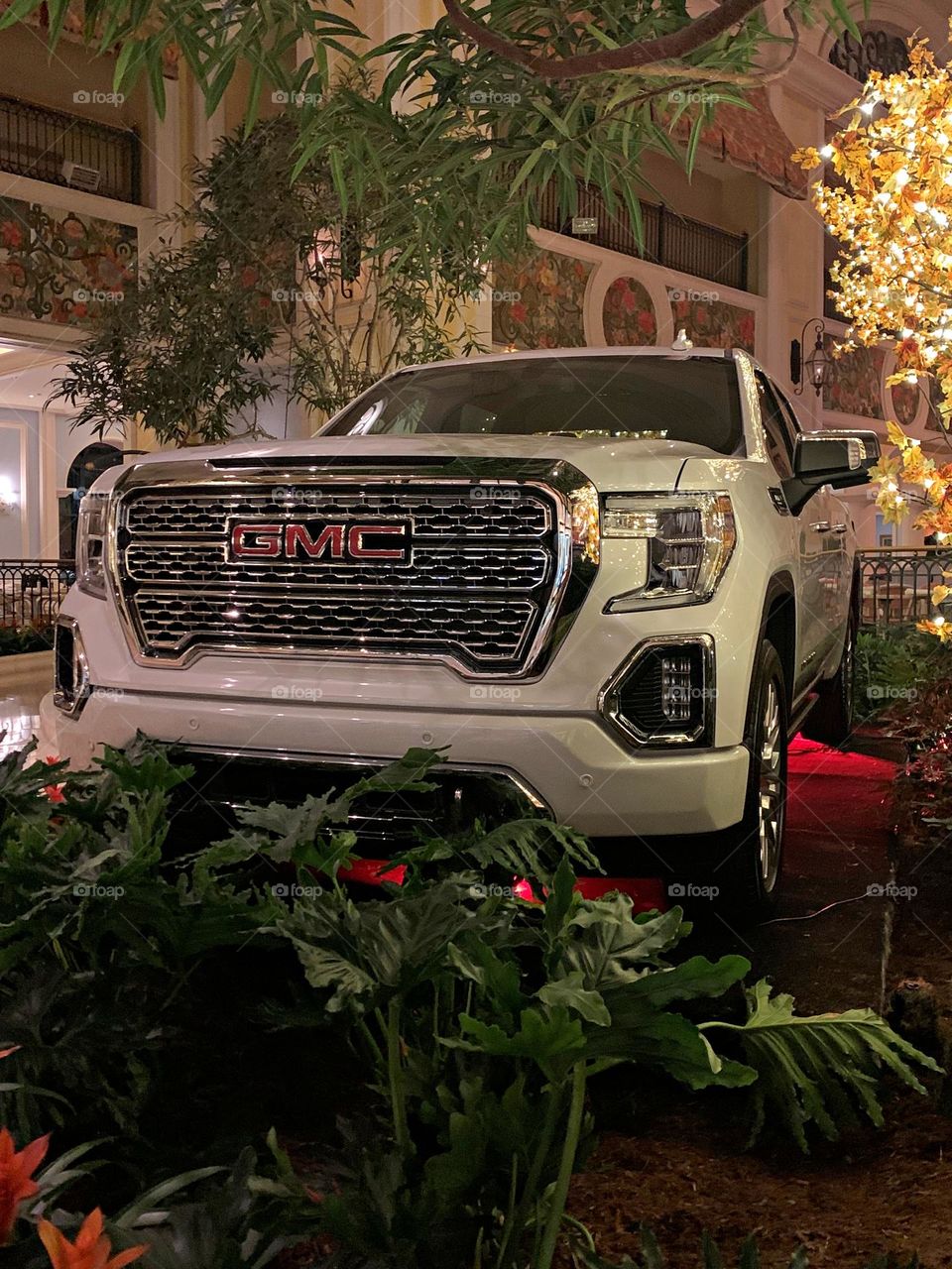 Cars with soul - Night shot - The 2023 Denali’s DURAMAX eye-catching exterior features many exclusives that help give the vehicle its signature look.