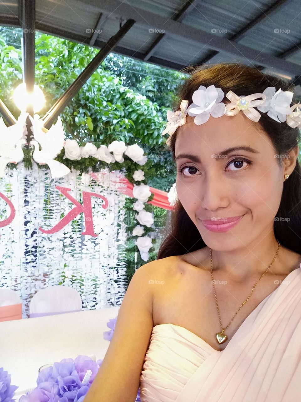 A woman’s selfie on bridesmaid attire 