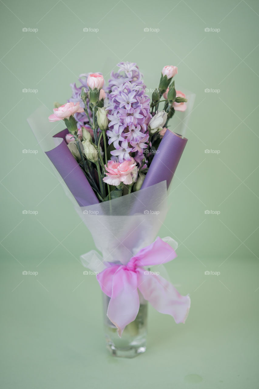 Spring bouquet in pink and purple colors 