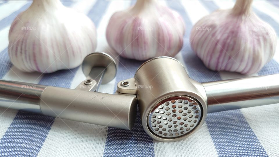 The main ingredient in a good salad dressing is fresh garlic. Press garlic to help.