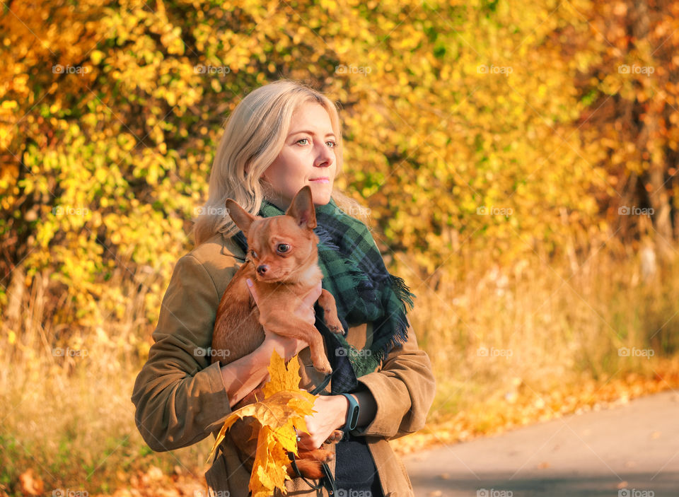 Woman with small dog 