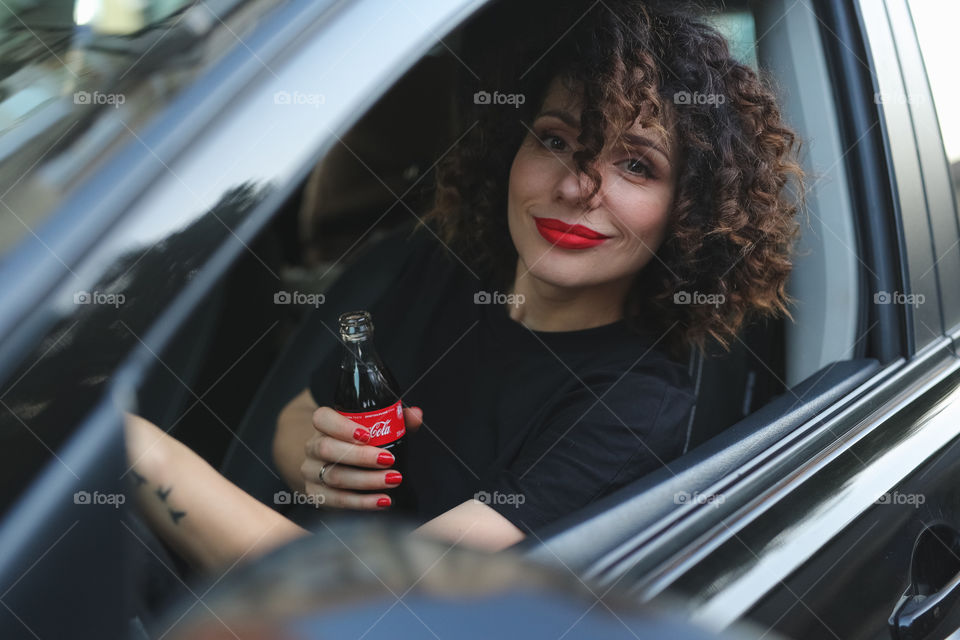 Cute beautiful girl with Coca-Cola 