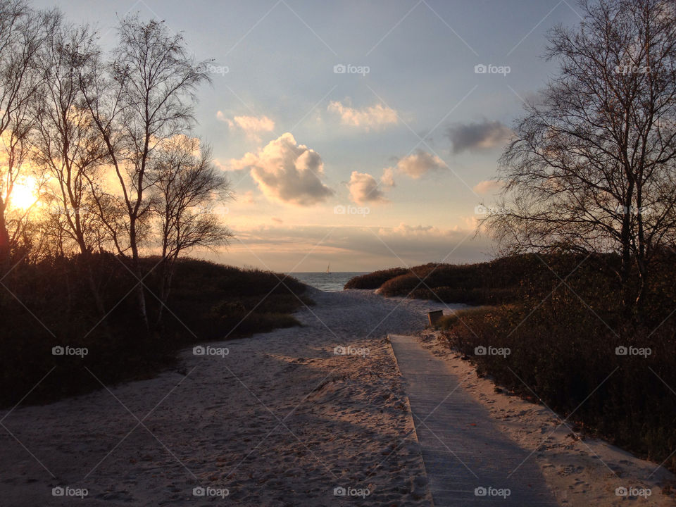 beach sunset clouds autumn by jethro