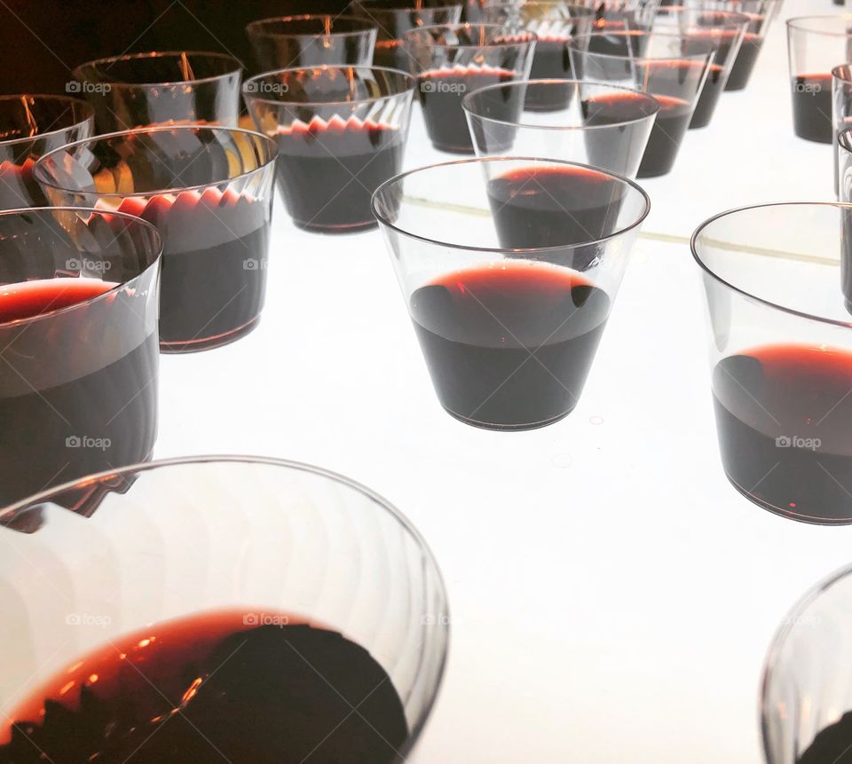 Bar filled with red wine cups